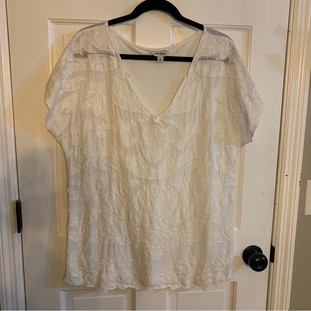Lucky Brand White V-neck Short Sleeve T-shirt with patterned overlay on front